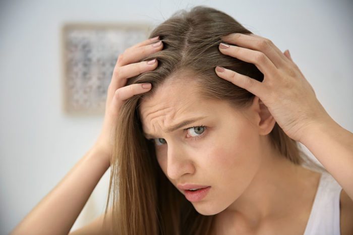How do you know if you have bugs in your hair?
